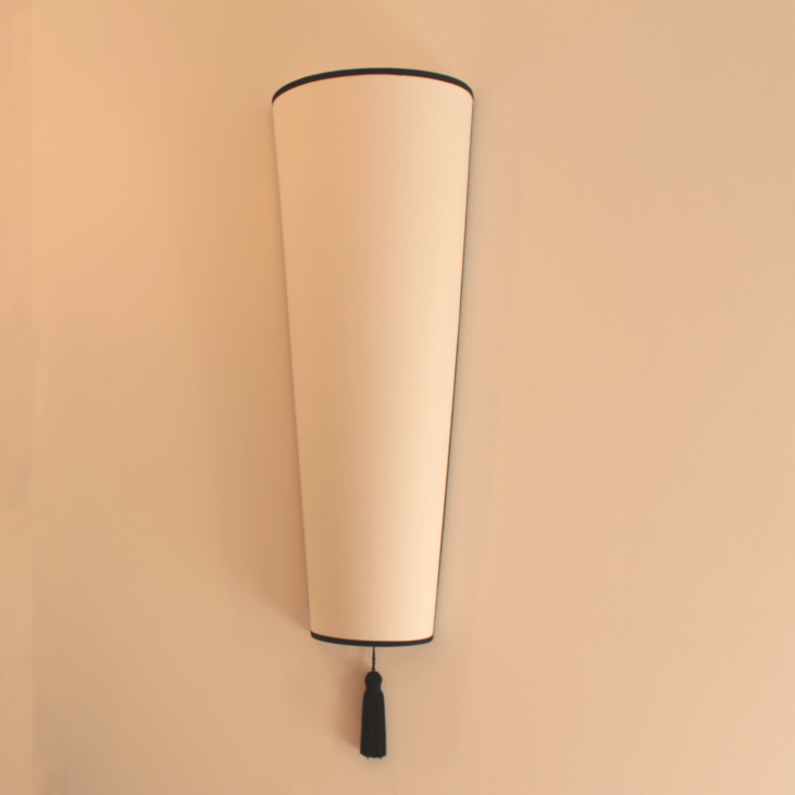 Elegant white Design wall light with black finish.