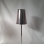 A metal shade to put on a floor lamp.