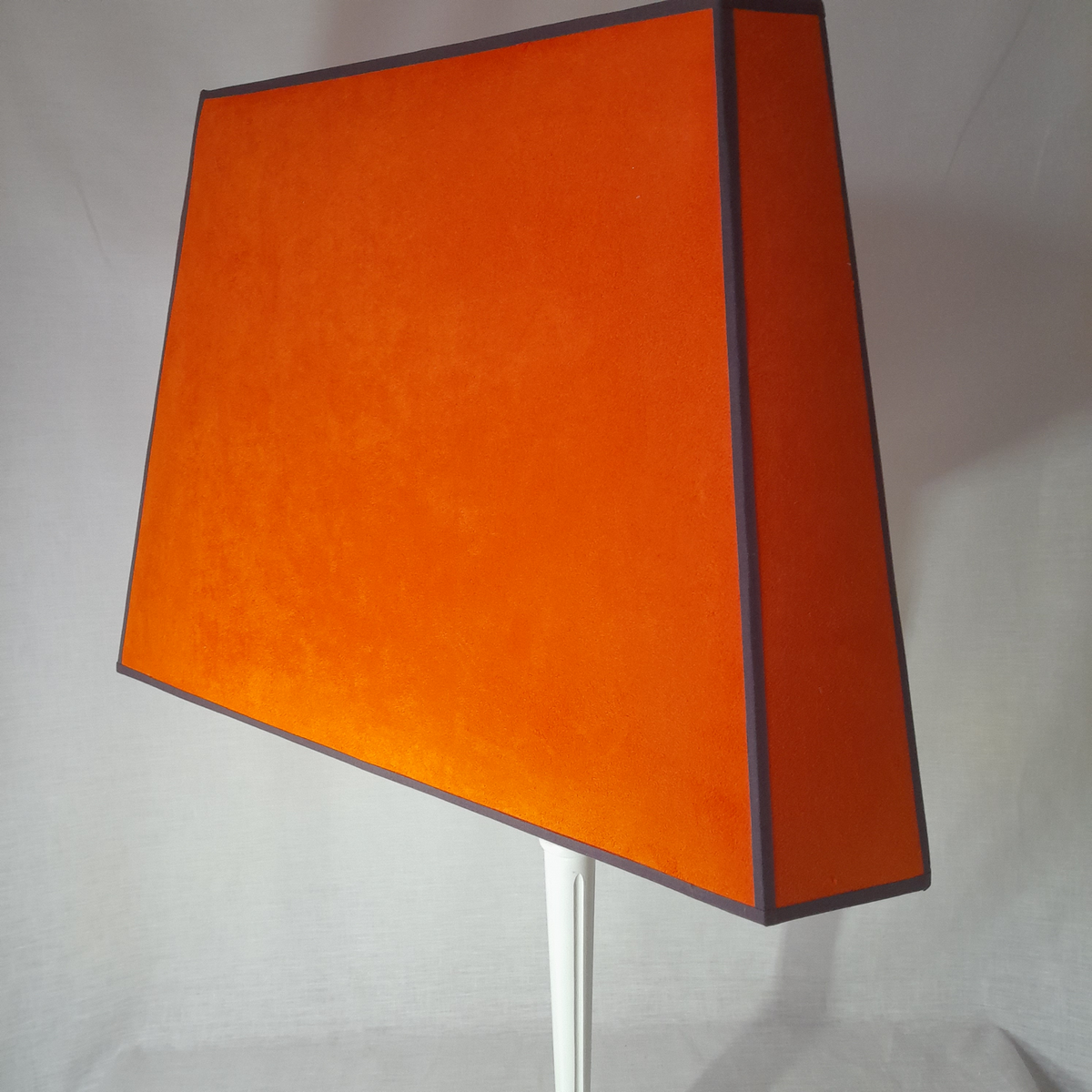 Restoration of an orange suede triangular lampshade